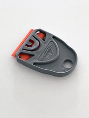 Holds orange plastic blades